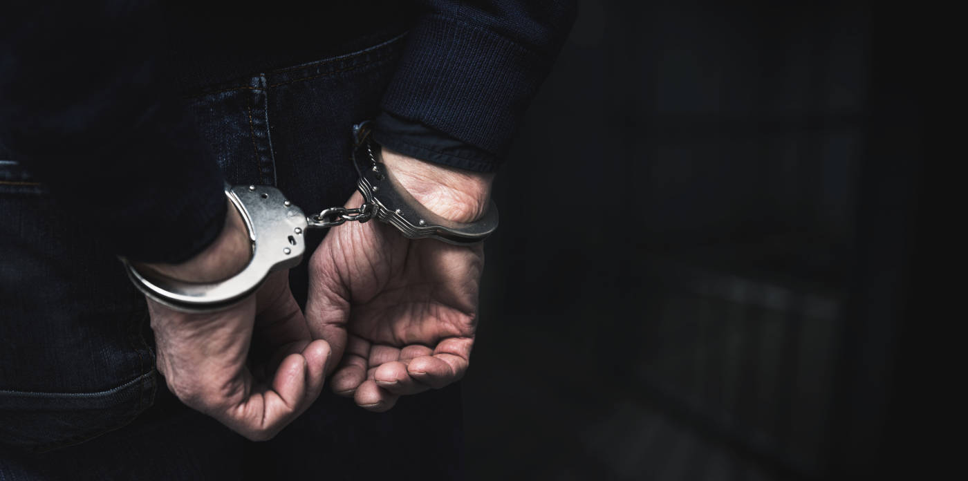 Handcuffed man