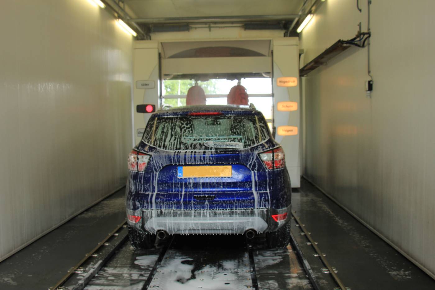 Car being soaped in wash