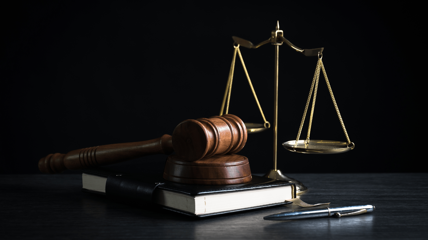 Law and Justice symbols on dark background