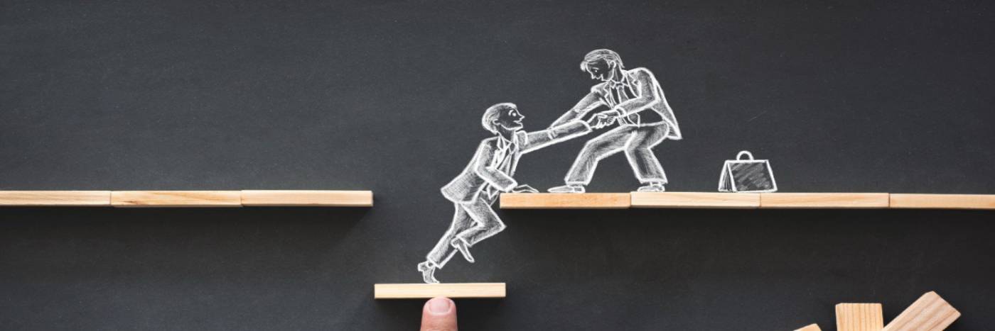 Drawing of men helping each other up