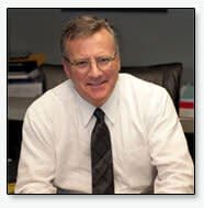 Attorney Scott Robbins in an office chair