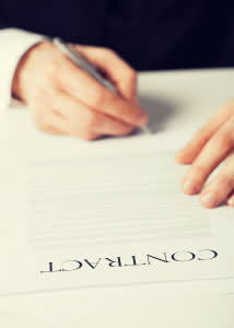 Businessman signing a contract