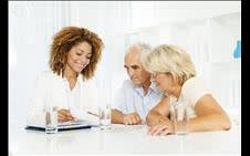 Older couple consulting with an attorney 