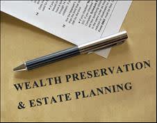 Pen on a wealth preservation and estate planning document 