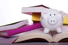 Piggy bank on books