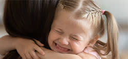 Daughter hugging her mom