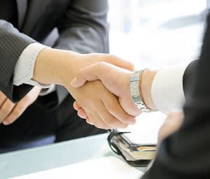 Two people shaking hands