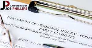 Paper with title "Statement of Personal Injury" on a clipboard