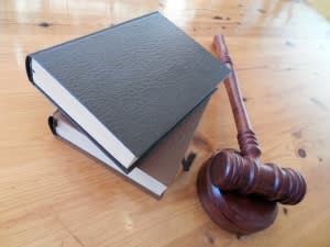 Gavel and stack of books