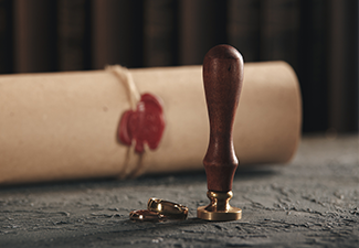 Red wax stamp on the paper document isolated