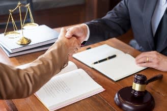 handshake over documents