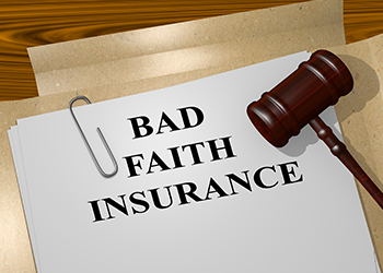 Bad faith insurance document in a folder with a gavel resting on top