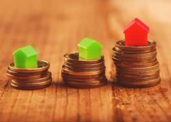 Small Houses on Stacks of Coins