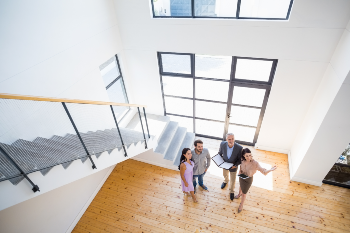 Couple Touring House with Realtors