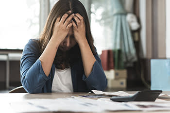 Woman stressed out by finances 