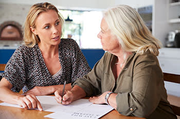 2 women working on their estate planning documents