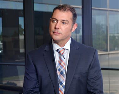Attorney Drew Prisner Looking into a Distance