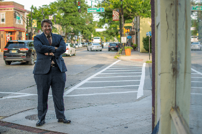 Attorney Fenza Standing on Sidewalk