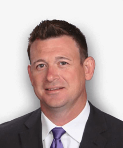 Coyne in a suit