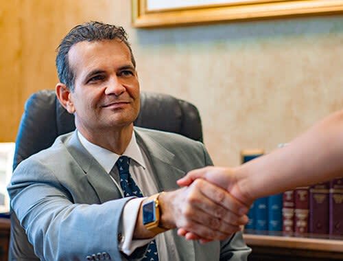 Attorney Thomas R. Cox III Shaking Hands