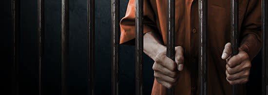 Man behind prison bars