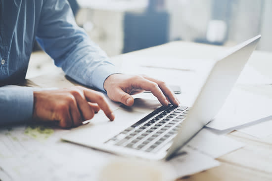 Businessman working on laptop