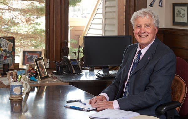 Attorney Robert Miller sitting at a desk