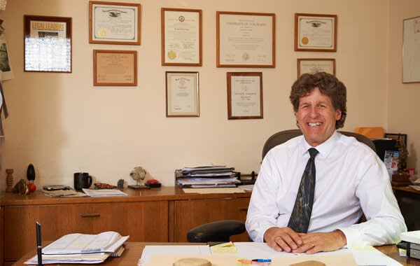Attorney David Harrison sitting at a desk