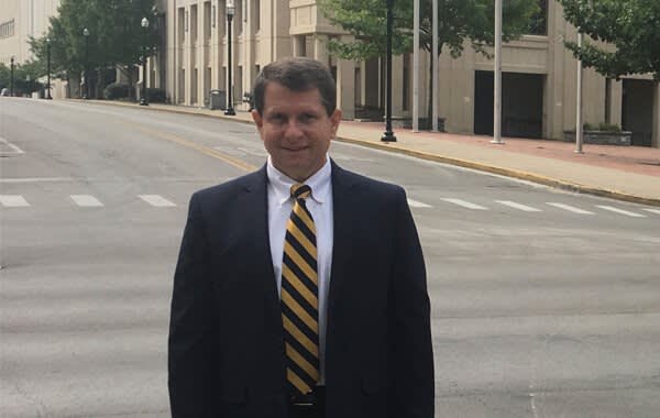 Attorney Michael Coblenz standing outside in a suit