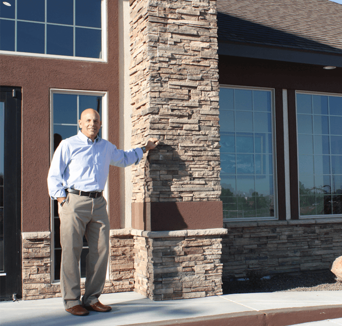 Attorney David M. Fogg standing outside of a buidling