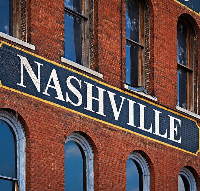Nashville sign painted on the side of a brick building