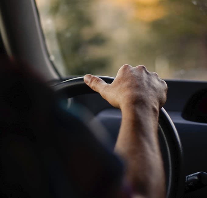 Man driving a car