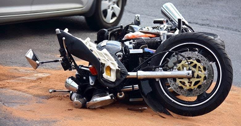 Motorcycle laying on road