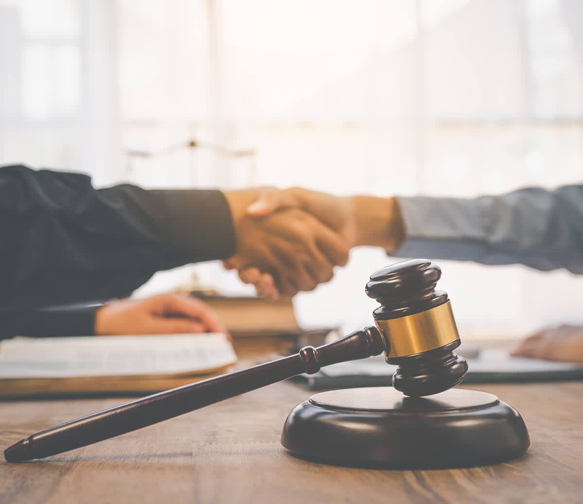 Handshake near gavel