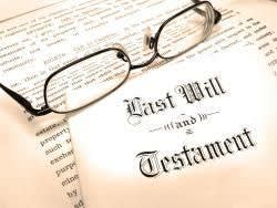 Last will and testament document with glasses on top