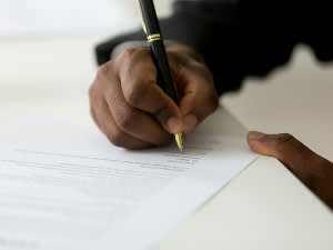 Person signing a document