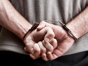 Person in handcuffs