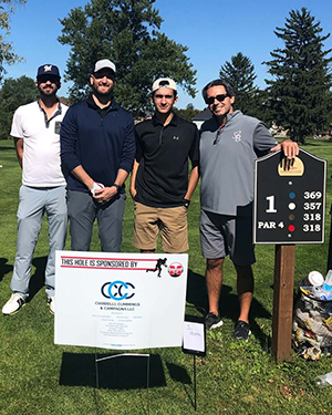 Ciardelli, Cummings, and Campagna team at golf course