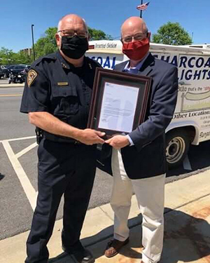 Patrick M. Cummings with Des Plaines Police Chief Bill Kushner