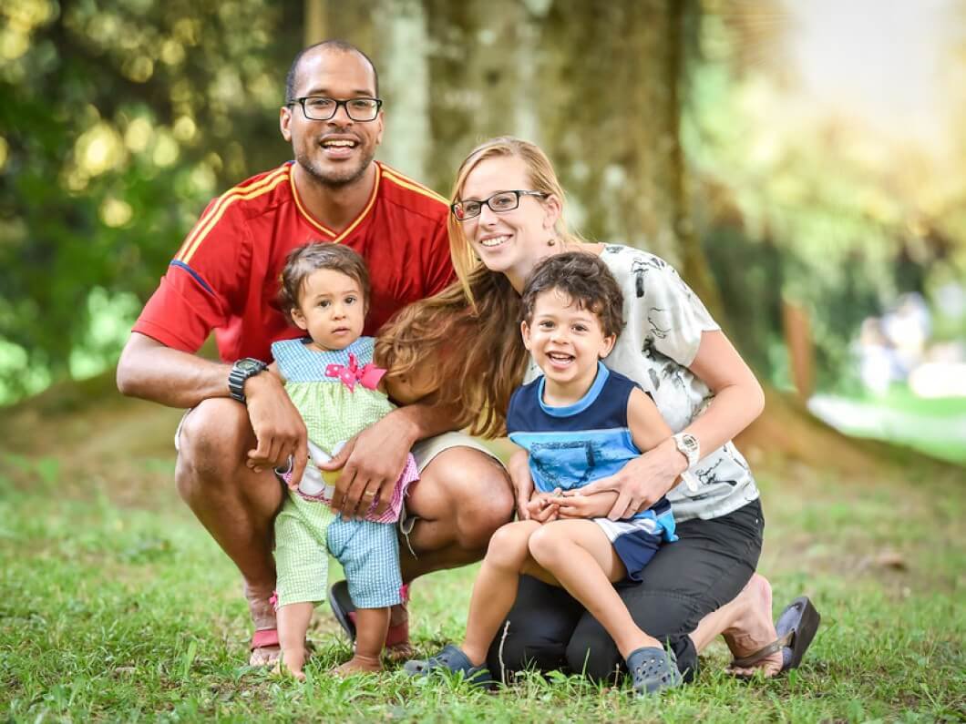 Happy family with two young children