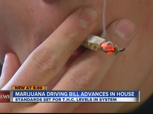 Smoking a marijuana cigarette on the news