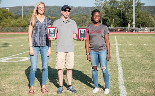 Scholarship Winner Standing with Attorney Fisher Wise