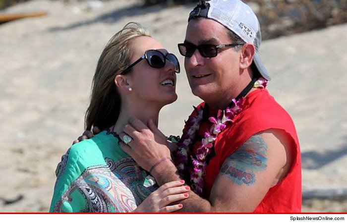 Charlie Sheen and Brett Rossi Embracing