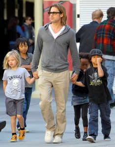 Brad Pitt Walking with His Children on the Street