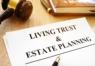 Living trust and estate planning form on a desk.