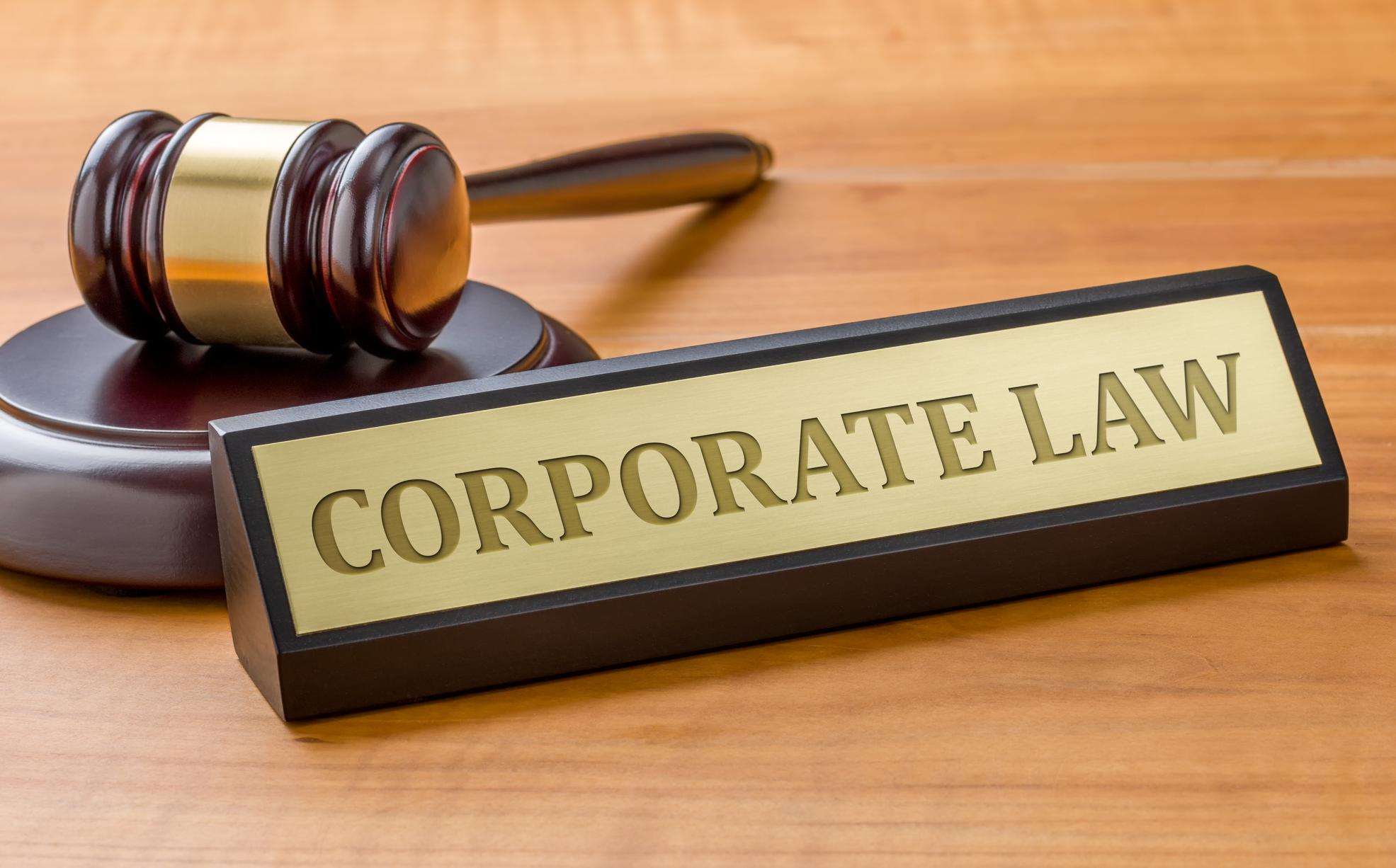 Gavel and plaque reading "Corporate Law"