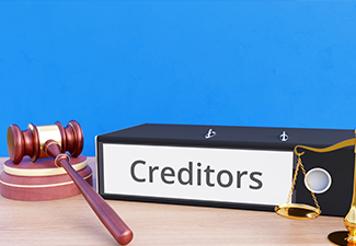 Creditors – Folder with labeling, gavel and libra – law, judgement, lawyer
