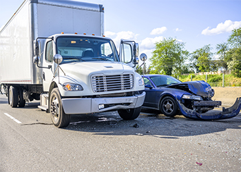 collision between truck and a car