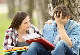 Friend Comforting to A Sad Student with Failed Exam