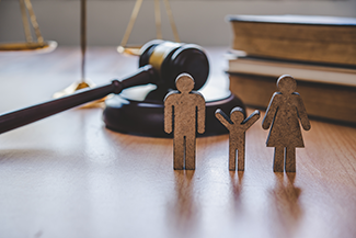 Family Law Concept with Gavel on Background